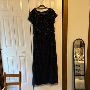 Navy blue with black sheer over layer and beaded. Beautiful MoB or MoG dress.